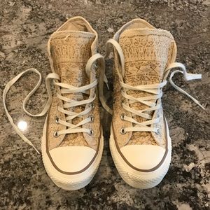 Chuck Taylors with gold snowflake pattern detail